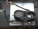 1977-79 Suzuki GS850 Speedometer Gauge & Housing Cover (072). Fixed Price $99.00.
