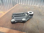 08-12 Kawasaki Ninja EX250 Rear Brake Caliper Bracket 43034-0021-18R. Fixed Price $8.32.
